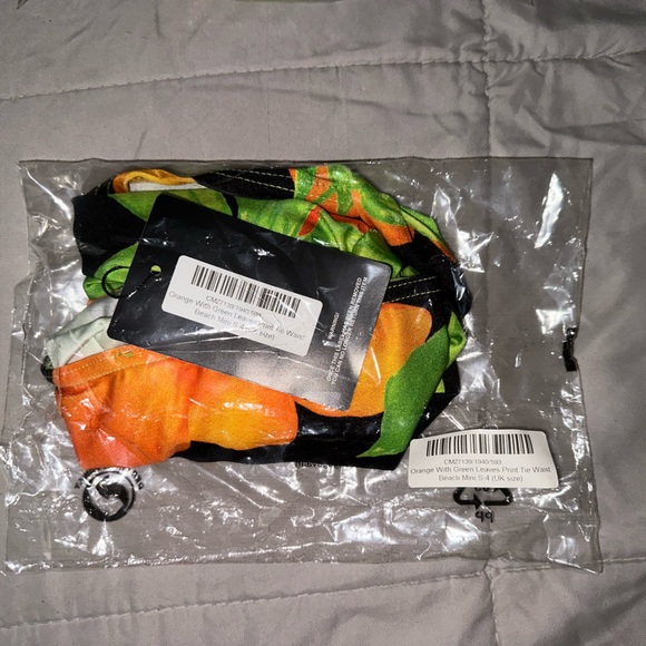 PrettyLittleThing
Orange With Green Leaves Print Bikini Bottom with Skirt - Picture 3 of 3